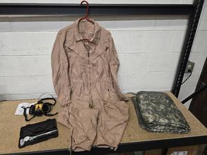 lot 16 image: US Army Combat Vehicle Crewman Coveralls - Medium Long, a Wet Weather Poncho Line - WOOBIE ACU Excellent condition, a dial caliper in shock proof case and a Half-Face Air Purifying respirator (HFAPR) Looks new