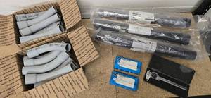 lot 24 image: 24 CANTEX 1 14 Rigid PVC Conduit elbows, 3 rolls of black insulation sleeving (adhesive lined - heat shrinkable), 2 Combination valve metering and proportioning and 1 Dial Caliper
