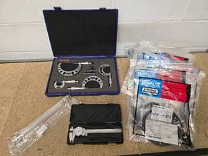 lot 62 image: 1 4-piece Metric Outside Micrometer set 1 - 100mm.01mm Machinist Tool, 15 new 4ft computer power extension cords, 1 new Liquid Level gauge and 1 dial caliper