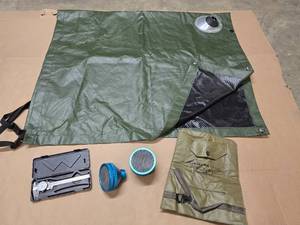 lot 46 image: Green Tarp with roof jack (approx 48 x 77), dial caliper, 2 blue filters assemblies and tripod cover