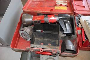 lot 821 image: Hilti Heavy Duty 10mm .27cal Single Cartridge Powder-Actuated Tool DX600N with Case