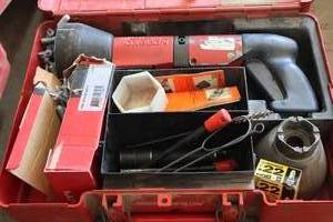 lot 822 image: Hilti Heavy Duty 10mm .27cal Single Cartridge Powder-Actuated Tool DX600N with Accessories and Case