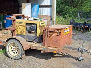 lot 764 image: Hobart Champion 16 Onan Performer 16XSL Air Cooled Gas Drive 115V230V 2035A Trailered Welder OM-741 with Knaack Job Box