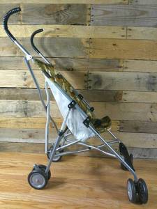 lot 240 image: Costco Camo Umbrella Dino Stroller