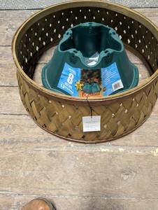 lot 403 image: 6 Foot Tree Stand w Woven Wicker Tree Shroud