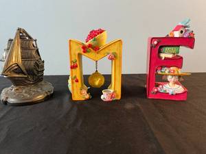 lot 42 image: Mary Engelbreit ME Figurines and Decorative Metal Ship