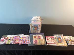 lot 47 image: Assorted Doll Clothing Sewing Patterns - McCalls, Simplicity