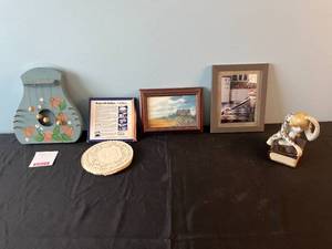 lot 56 image: Assorted Home Decor Items Including Framed Art, Door Harp, Ceramic Monkey, Roylcraft Doilies