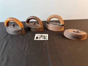 lot 87 image: Set of Antique Cast Iron Irons with Wooden Handles