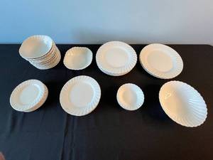 lot 92 image: White Ceramic Dinnerware Set with Swirl Pattern