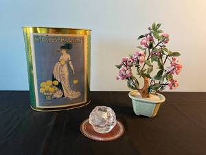 lot 98 image: Vintage McCalls Magazine TinWastebasket, Glass Candle Holder, and Decorative Artificial Flowering Tree Lot