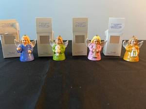 lot 140 image: Lot of 4 Goebel Hummel Annual Angel Ornaments (1987, 1988, 1989, 1990)