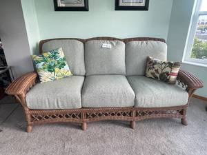 lot 2 image: Wicker Sofa and Glass-Top Coffee Table Set
