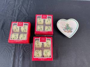 lot 180 image: Holiday Themed Lot Nikko Heart Shaped Plate, Lenox Napkin Rings, and Yankee Candle