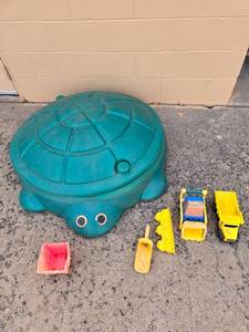 lot 19 image: Childrens Outdoor Turtle Sandbox with Toy Trucks and Shovel