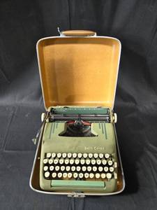 lot 27 image: Vintage Smith-Corona Silent-Super Portable Typewriter with Case