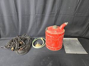 lot 86 image: Lot of Vintage Red Fuel Can, Long Extension Cord, and Metal Sheet