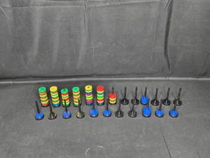 lot 123 image: Colorful Stacking Rings and Pegs Educational Toy Set
