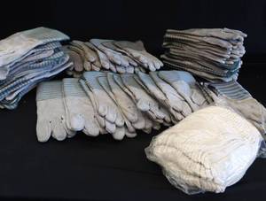 lot 58 image: BOX OF ALMOST NEW WELDING GLOVES  LINERS