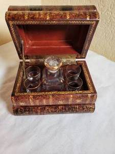 lot 35 image: French Leather Book Tantalus Set