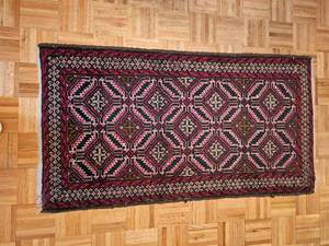lot 61 image: Persian Balouch Style Area Rug