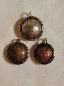 lot 138 image: Dimensional Coin Amulet Pendants, trio