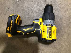 lot 30 image: DEWALT 20V Compact Cordless 12 in. Hammer Drill (Tool Only)    Customer Returns See Pictures