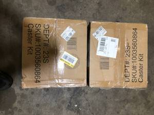 lot 31 image: Husky 4 in. Caster Kit for Heavy Duty Welded Steel Garage Base Cabinets   Customer Returns See Pictures