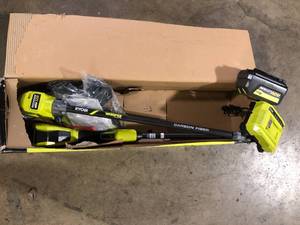 lot 37 image: RYOBI 40V HP Brushless Whisper Series 17 in. Cordless Battery Carbon Fiber Shaft String Trimmer w 6.0 Ah Battery & Charger Customer Returns See Pictures