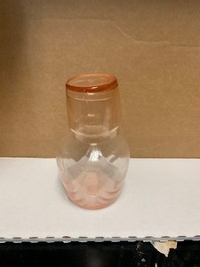 Bedside water container, pink depression glassware
