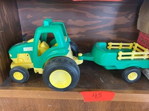 Plastic tonka tractor and trailer