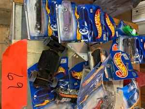 Hot wheels, plastic pistols, tractor and misc