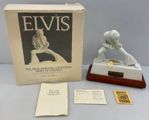 lot 19 image: 1977  ELVIS PRESLEY The Designer Collection From McCormick Distilling Company Decanter With Music Box Stand (NIB)
