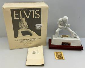 lot 23 image: 1977  ELVIS PRESLEY The Designer Collection From Mccormick Distilling Company Decanter With Music Box Stand (NIB)