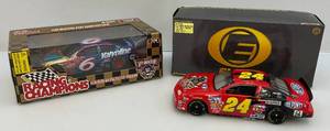 lot 113 image: Two 124 Scale Diecast Cars Including Elite Brand (Jeff Gordon) Jurassic Park & Racing Champions 50Th Anniversary #6 Brad Keselowski Both (NIB)