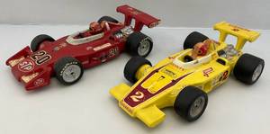 lot 164 image: Two Misc. Indy Car Decanters (Empty)