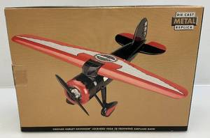 lot 191 image: Harley-Davidson Limited Edition  Diecast Lockhead Vega 5B Highwing Airplane Bank Replica (NIB)