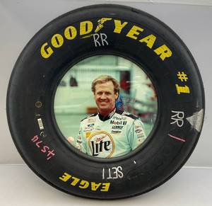 lot 197 image: (VERY COOL) NASCAR Official Race Tire Frame With Rusty Wallace Picture