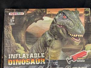 lot 60 image: Yongjule Inflatable Dinosaur with Bonus Inflator