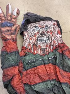 lot 96 image: Inflatable Halloween Costume with Scary Face Design
