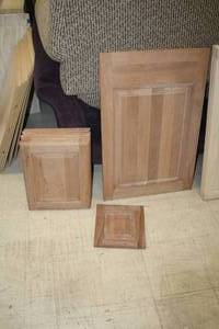 lot 1559 image: Lot of (9) Wood Assorted Cabinet Doors UndrilledStained Finish