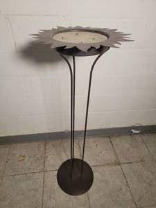 lot 103 image: Stylish Pressed Metal Candle Stand - Sun