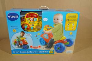 lot 4 image: Vtech 2-In-1 Learn & Zoom Motorbike