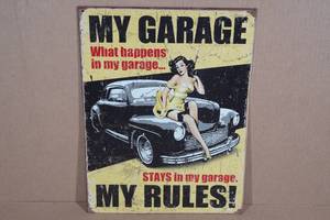 lot 49 image: Metal Garage Sign