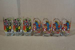 lot 112 image: 7 Collectors Cups with Basket