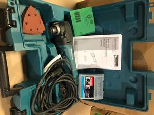 Makita 3 Amp Corded Variable Speed Oscillating Multi-Tool Kit With Blade, Sanding Pad, Sandpaper, Adapter, Hard Case   Customer Returns See Pictures