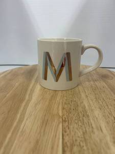 Mug With An Artistic Letter M  Approximately 8 Pieces 