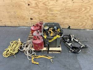 lot 171 image: Pallet of Safety harnesshoist Items with Old gas cans