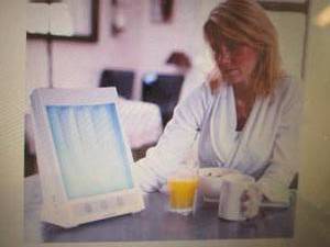 lot 112 image: SunTouch Plus Light and Ion Therapy...
