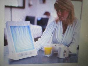 lot 114 image: SunTouch Plus Light and Ion Therapy...